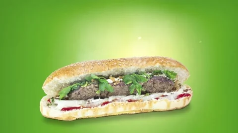 Lule kebab in bread on green background position from bottom to center Stock Footage 135073122
