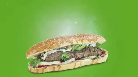 Lule kebab in bread on green background Stock Footage 135176977