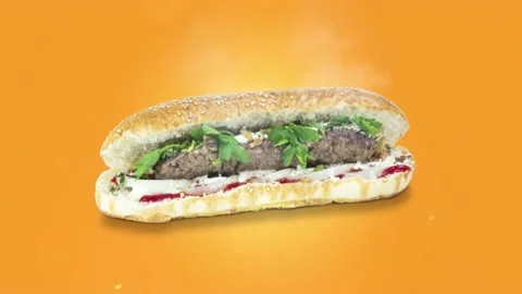 Lule kebab in bread on orange background position from top to center Stock Footage 135073352