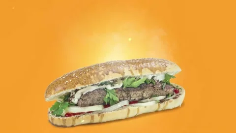 Lule kebab in bread on orange background Stock Footage 135177087