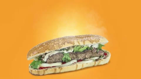 Lule kebab in bread on orange background Stock Footage 135177088
