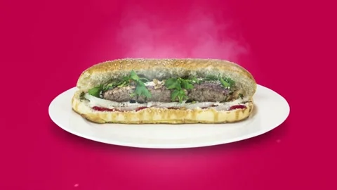 Lule kebab in bread on purple background direction from top to center Stock Footage 135127080