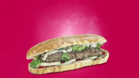 Lule kebab in bread on purple background Stock Footage 135177141