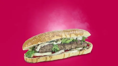 Lule kebab in bread on purple background Stock Footage 135177143