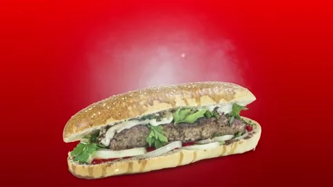 Lule kebab in bread on red background Stock Footage 135177179