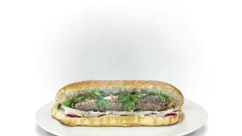 Lule kebab in bread on white background direction from bottom to center Stock Footage 135127580