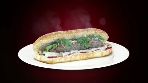 Lule kebab in bread on white plate the served with greens, onions, mayonnaise Stock Footage 134470861