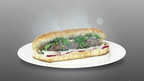 Lule kebab in bread on white plate the served with greens, onions, mayonnaise Stock Footage 134471329