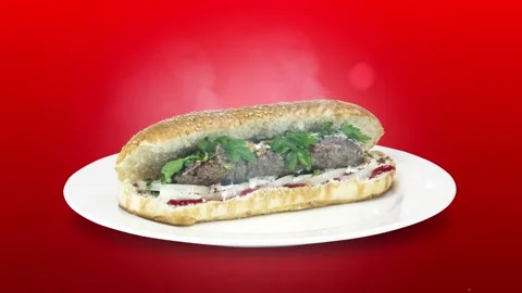 Lule kebab in bread on white plate the served with greens, onions, mayonnaise Stock Footage 134471644