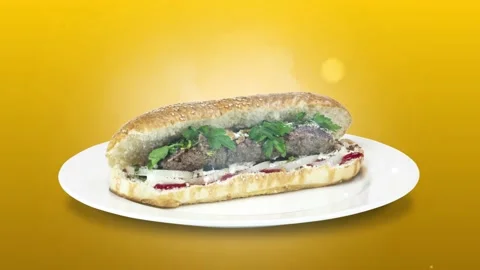 Lule kebab in bread on white plate the served with greens, onions, mayonnaise Stock Footage 134471707