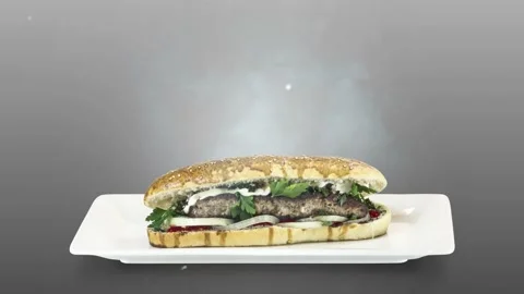 Lule kebab in bread on white plate on gray background Stock Footage 135143318