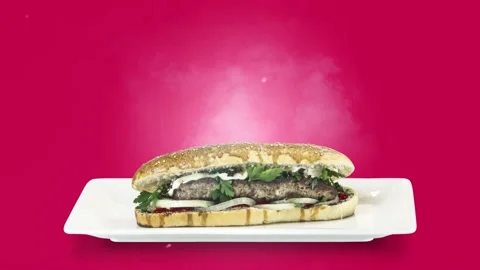 Lule kebab in bread on white plate on purple background Stock Footage 135146043