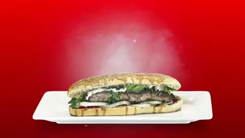 Lule kebab in bread on white plate on red background Stock Footage 135146195