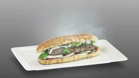 Lule kebab in bread on white plate on gray background Stock Footage 135153132