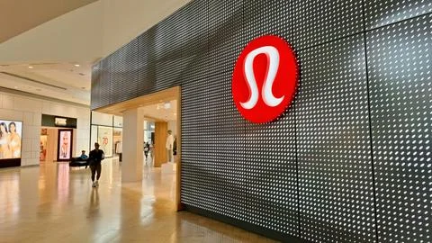 Lululemon store storefront inside a modern indoor shopping mall. Stock Photos
