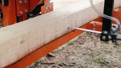 Lumber Industry. Pine board processing at the Industrial Woodworking Plant Stock Footage 168674971