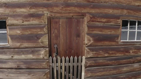 Lumber Log Cabin Snow Cold Environment Winter close up door Stock Footage 145925751