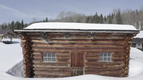 Lumber Log Cabin Snow Cold Environment Winter moving in shot Stock Footage 145927402