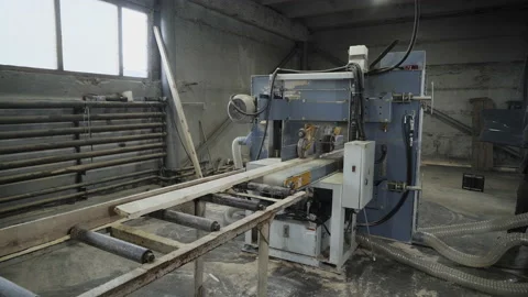 Lumber Plank Processing By An Industrial Equipment Machine At A Timber Factory Stock Footage 159968559
