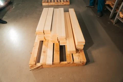The lumber is ready to be sent to the loading workshop. A stack of new wooden Stock Photos