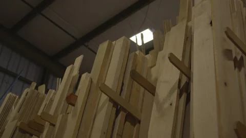 Lumber Stacked in Warehouse Stock Footage 208778362