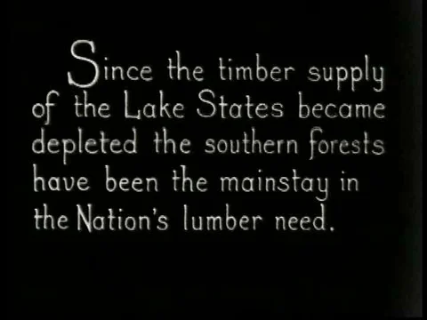 A lumber yard with tall stacks of cut wood in the 1930s. Stockbeeldmateriaal 75768078