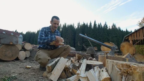 Lumberjack chopping wood Stock Footage 120744934