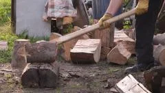 https://images.pond5.com/lumberjack-cutting-firewood-logs-axe-footage-057455888_iconm.jpeg