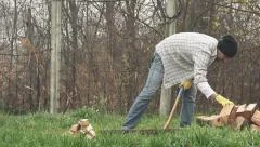 The Lumberjack Is Cutting Wood Or Firewood With Axe Outdoors. Stock Photo,  Picture and Royalty Free Image. Image 97231743.