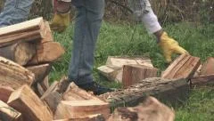 The Lumberjack Is Cutting Wood Or Firewood With Axe Outdoors. Stock Photo,  Picture and Royalty Free Image. Image 97231743.