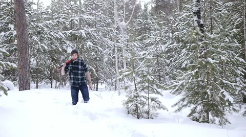 Lumberjack with his ax returns from work of the winter forest Stock Footage 60051912