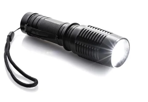 Luminous black flashlight Stock Photos