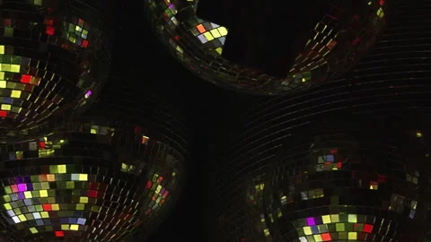 Luminous Disco Balls Reflect a Vivid Array of Dancing Night Lights Stock Footage 334929073