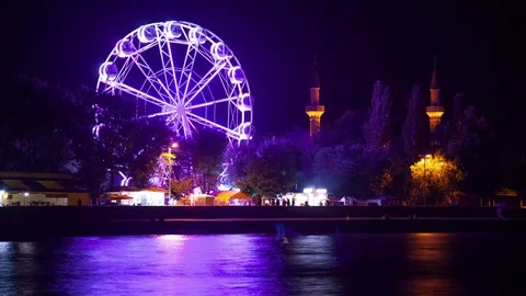 Luminous Ferris wheel at night. Stock Footage 78354717
