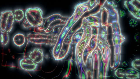 Luminous humanoid figure exploring a futuristic interface Stock Footage 340514134