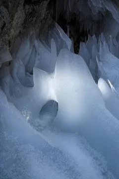 Luminous ice formations in cave Stock Photos