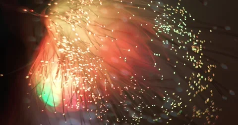 A luminous lamp in the form of a broom made of an optical fiber bundle. Stock Footage 145207082