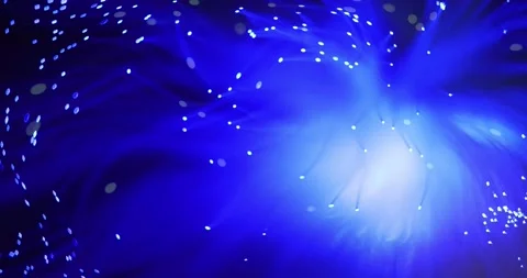 A luminous lamp in the form of a broom made of an optical fiber bundle. 库存影片 145207086