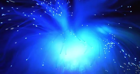 A luminous lamp in the form of a broom made of an optical fiber bundle. Stock Footage 145207455