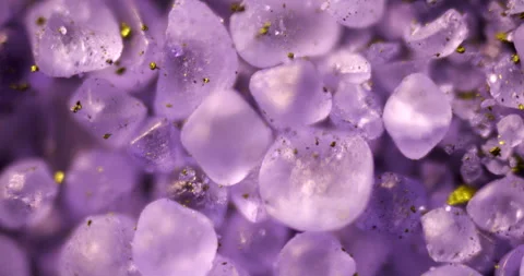 Luminous organic dye crystals under microscope with metallic sheen Stock Footage 308432452