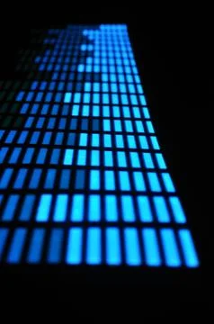 Luminous panel of pixels, with neon blue with green color and an equalizer Stock Photos