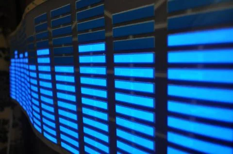 Luminous panel of pixels, with neon blue with green color and an equalizer 스톡 사진