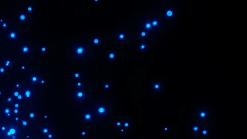 Luminous particles fly in the dark Stock Footage 166582184
