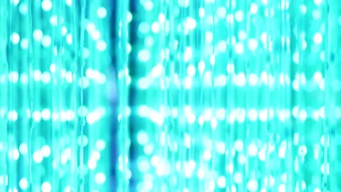 Luminous pink and purple strings creating an artistic light exhibition display Video stock 327193362