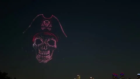 Luminous pirate skull drone light show illuminating seoul's night sky Stock Footage 343066238