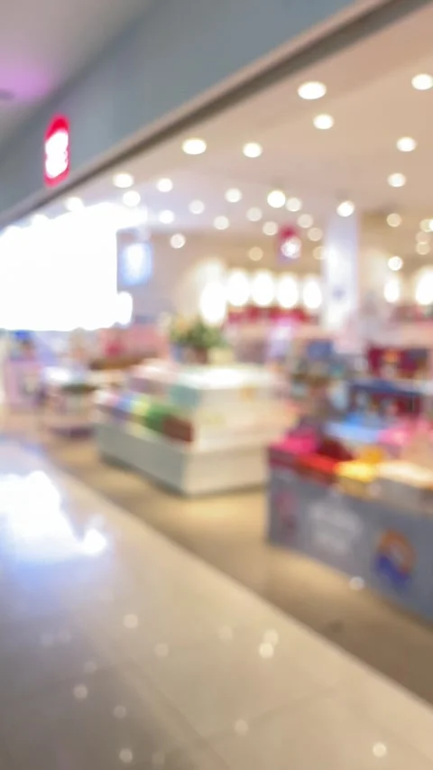 Luminous Retail Dynamics: An Abstract View of a Vibrant Modern Commercial I.. Stock-Footage 326036219