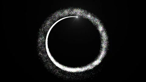A luminous star moves in a circle, leaving behind a trail of multicolored stars Stock Footage 274159423