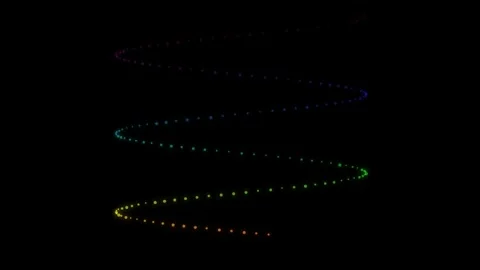 A luminous trail of fireflies dancing in the night sky 库存影片 334621403