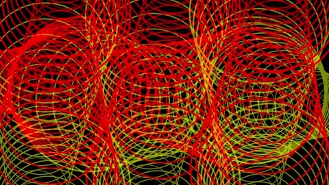 Luminous tunnels, consisting of red and yellow circles, rotate in 3d space Stock Footage 221488083