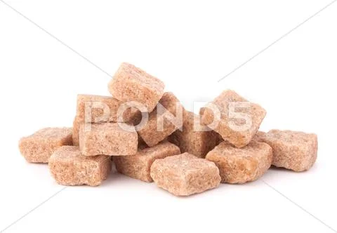 Lump brown cane sugar cubes Stock Photos